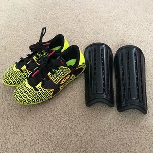 Under Armour boys cleats size 11c and shin guards!